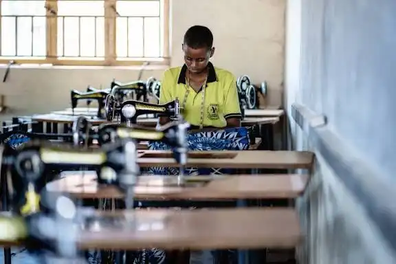 Young people learning practical vocational skills